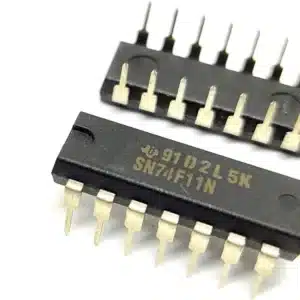 7411 triple 3-input AND gate IC in DIP package, digital logic IC for performing AND operations in combinational circuits.